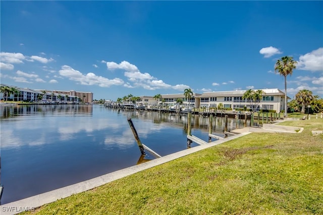 1950 Beach Pkwy Unit 103, Cape Coral, FL 33904 - view of dock featuring a yard and a water view