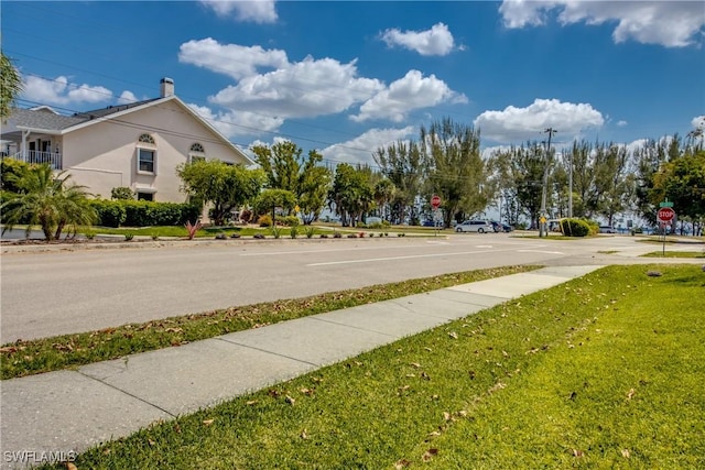 1950 Beach Pkwy Unit 103, Cape Coral, FL 33904 - view of street featuring traffic signs and sidewalks