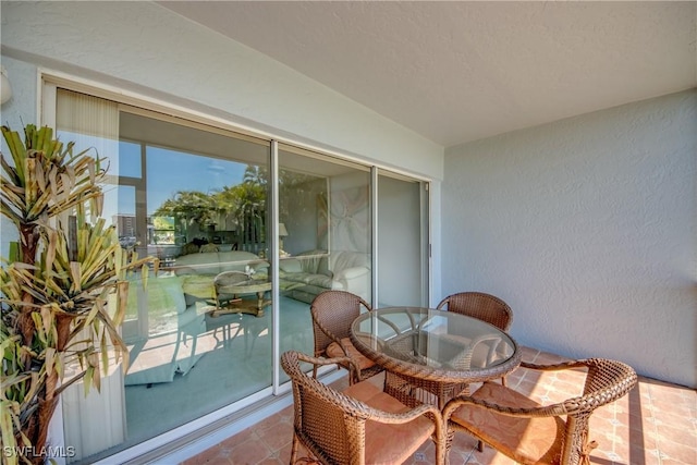 1950 Beach Pkwy Unit 103, Cape Coral, FL 33904 - balcony with outdoor dining space