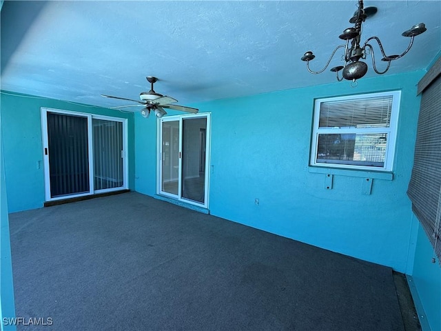 view of patio with ceiling fan