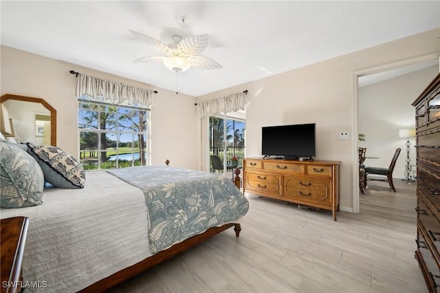 bedroom with access to exterior, light wood-style flooring, baseboards, and ceiling fan