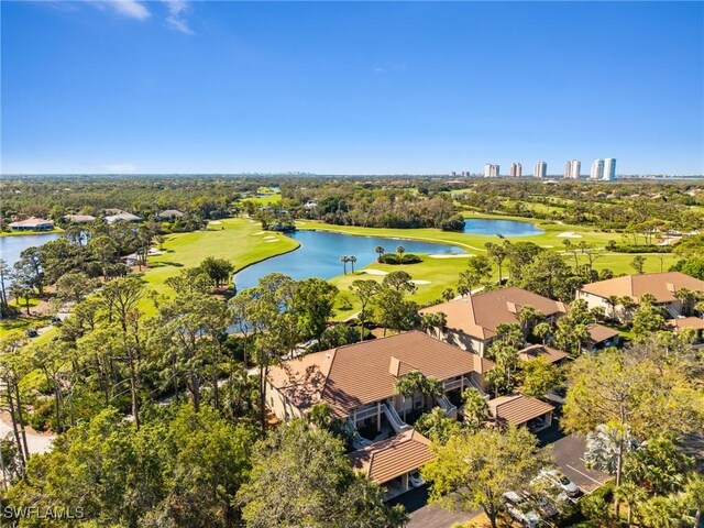 aerial view featuring view of golf course and a water view