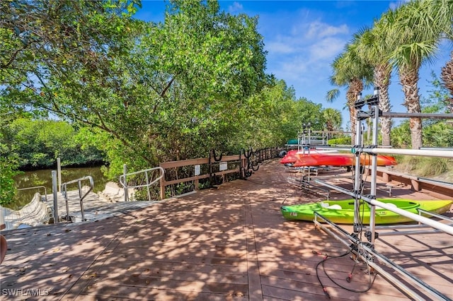 view of property's community with a dock