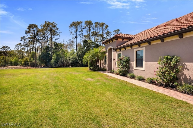 9149 Isla Bella Cir, Bonita Springs, FL 34135 - view of green lawn