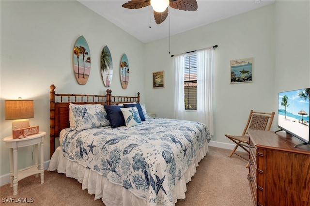 bedroom featuring a ceiling fan, carpet, and baseboards