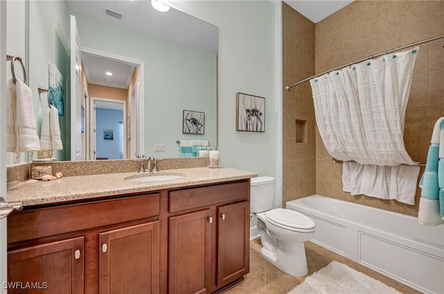 9149 Isla Bella Cir, Bonita Springs, FL 34135 - full bathroom featuring toilet, vanity, shower / bathtub combination with curtain, and tile patterned flooring