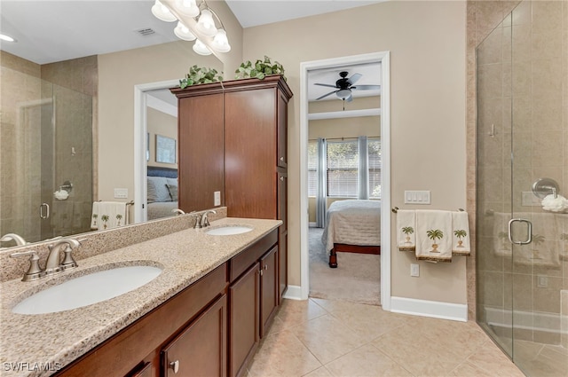 ensuite bathroom with ceiling fan, visible vents, ensuite bathroom, and a sink