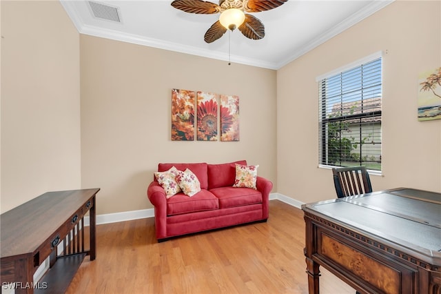 9149 Isla Bella Cir, Bonita Springs, FL 34135 - living area with a ceiling fan, crown molding, light wood-style floors, and baseboards