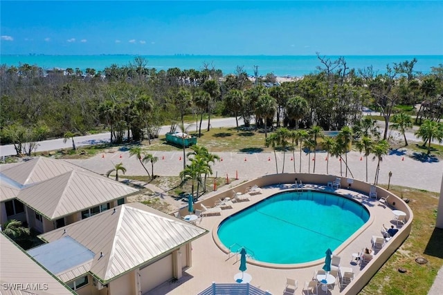 200 Periwinkle Way Unit 132, Sanibel, FL 33957 - view of pool with a water view and a fenced in pool