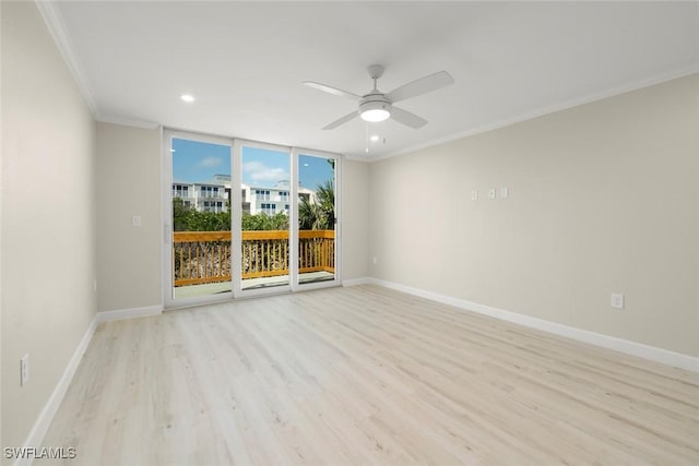 200 Periwinkle Way Unit 132, Sanibel, FL 33957 - unfurnished room featuring ornamental molding, baseboards, and wood finished floors