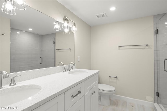 200 Periwinkle Way Unit 132, Sanibel, FL 33957 - full bath with a shower stall, visible vents, and a sink