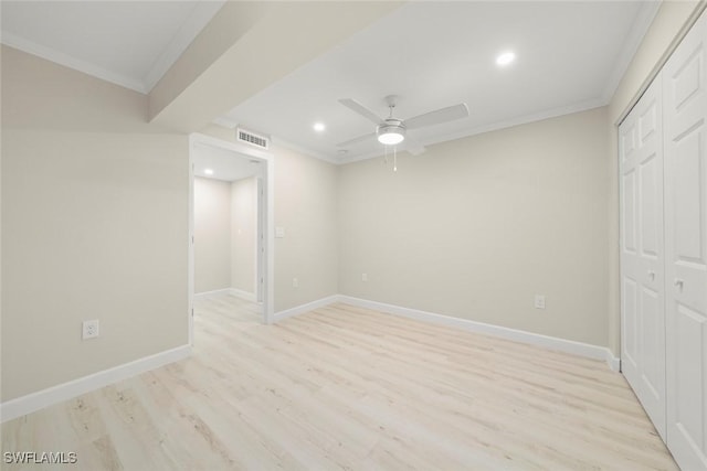 200 Periwinkle Way Unit 132, Sanibel, FL 33957 - unfurnished bedroom with light wood finished floors, baseboards, visible vents, and crown molding