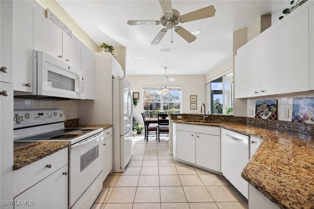 kitchen featuring ceiling fan, light tile patterned floors, white appliances, white cabinetry, and a sink