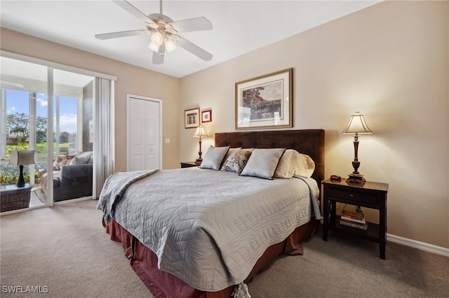 carpeted bedroom featuring access to exterior, a closet, a ceiling fan, and baseboards