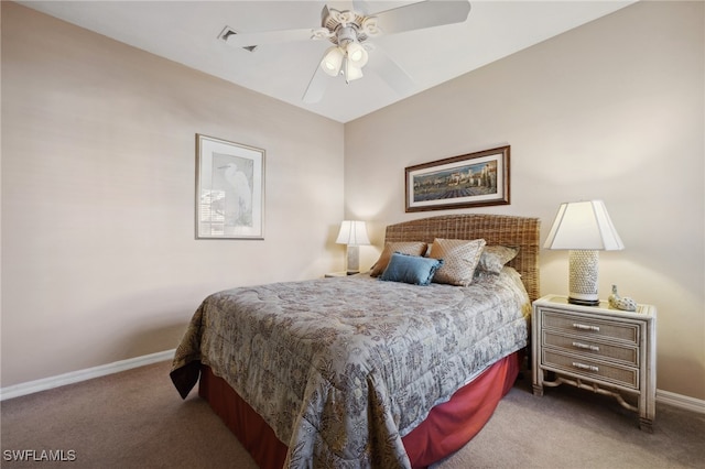 carpeted bedroom featuring ceiling fan and baseboards