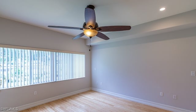 empty room with recessed lighting, baseboards, light wood-style flooring, and ceiling fan