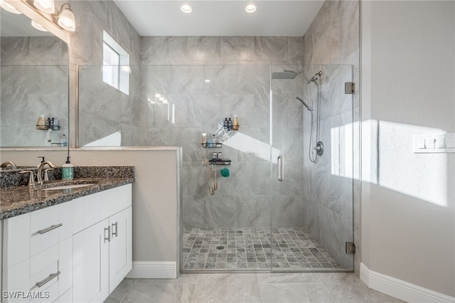 full bathroom with recessed lighting, a stall shower, vanity, and baseboards