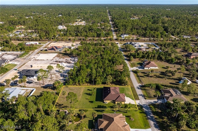 bird's eye view with a forest view