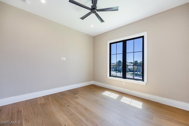 unfurnished room featuring ceiling fan, recessed lighting, baseboards, and light wood-type flooring