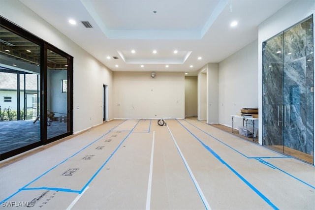 interior space with recessed lighting, a tray ceiling, visible vents, and community basketball court