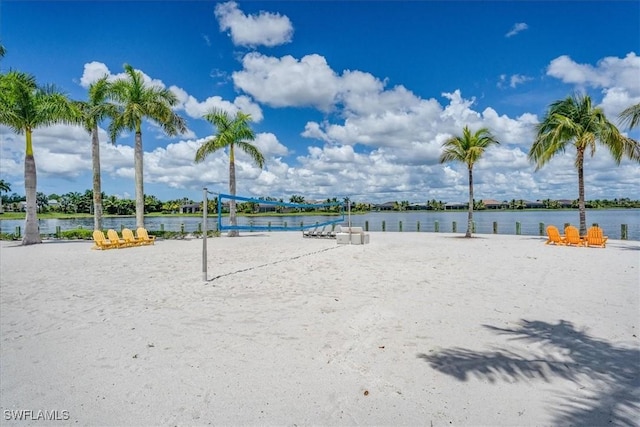 view of community featuring a water view and volleyball court