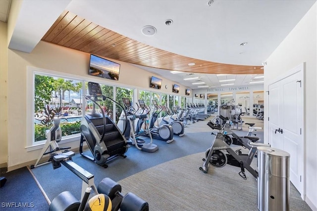 workout area with wooden ceiling