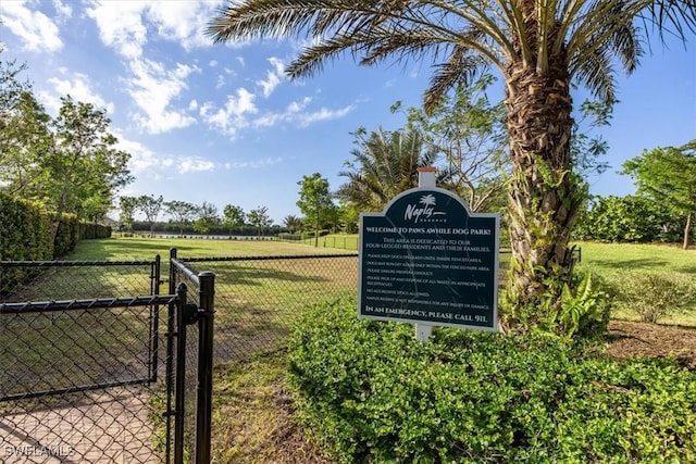 exterior details with a gate and fence