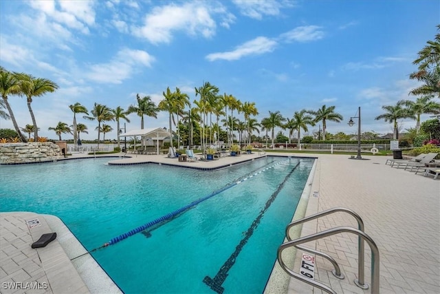 pool with a patio area