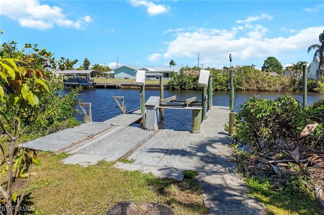 2032 Bahama Ave, Fort Myers, FL 33905 - view of dock with a water view and boat lift