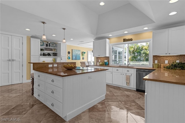 kitchen featuring stainless steel dishwasher, open shelves, white cabinets, and plenty of natural light