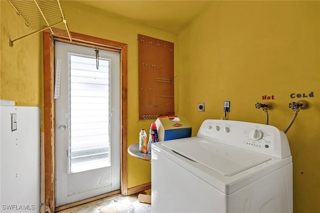 laundry room with plenty of natural light, washer / dryer, and laundry area