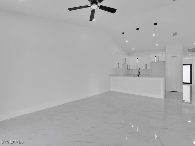 unfurnished living room featuring recessed lighting, visible vents, marble finish floor, and vaulted ceiling