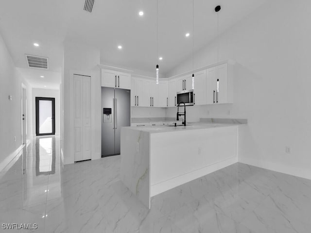 kitchen with visible vents, light countertops, appliances with stainless steel finishes, white cabinets, and marble finish floor