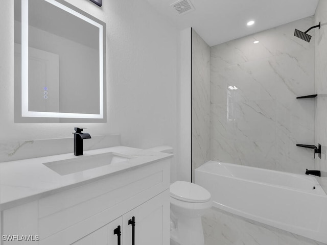 bathroom with visible vents, toilet, shower / bath combination, marble finish floor, and vanity