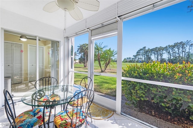 sunroom / solarium with ceiling fan