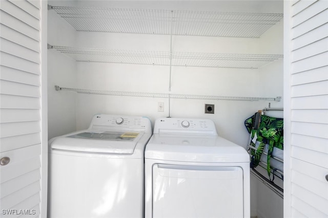 laundry area featuring washer and dryer and laundry area