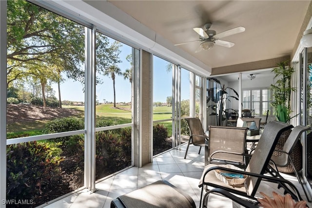 sunroom with a ceiling fan