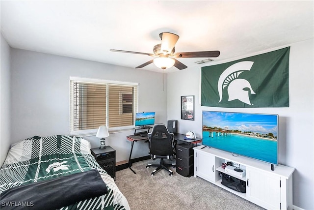 carpeted bedroom with a ceiling fan