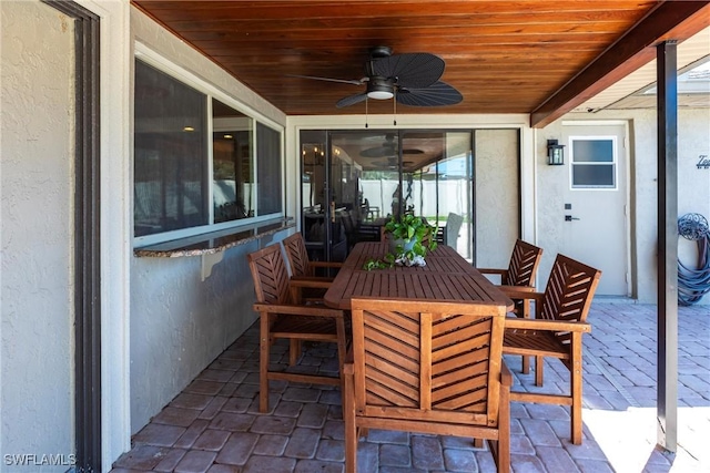 view of patio / terrace featuring outdoor dining space and a ceiling fan