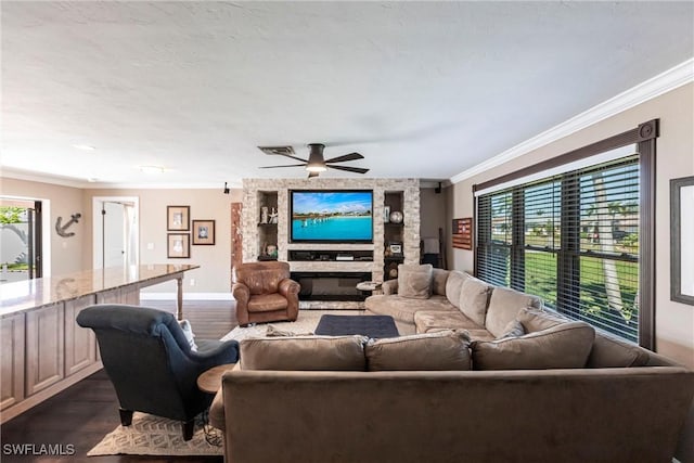 living room with ornamental molding, baseboards, ceiling fan, and dark wood-style flooring