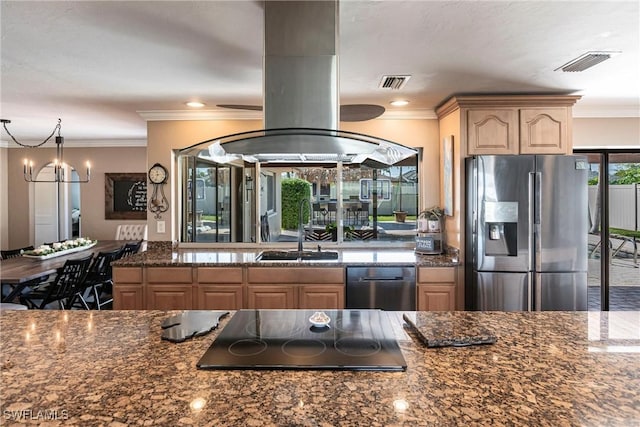 kitchen with visible vents, island exhaust hood, stainless steel appliances, and a sink