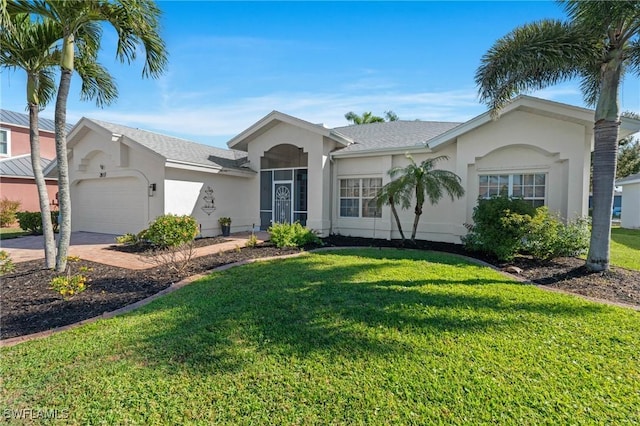 ranch-style home with stucco siding, driveway, a front lawn, and an attached garage