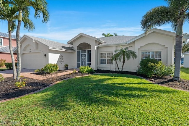 2817 SW 29th Ave, Cape Coral, FL 33914 - ranch-style house featuring stucco siding, an attached garage, a front lawn, and driveway