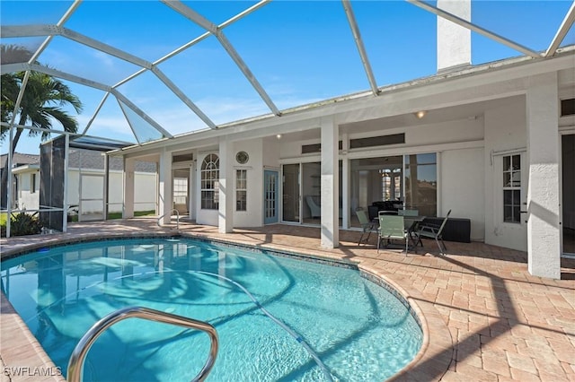 pool featuring a patio and a lanai