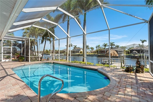 2817 SW 29th Ave, Cape Coral, FL 33914 - swimming pool with a patio, boat lift, a lanai, and a boat dock