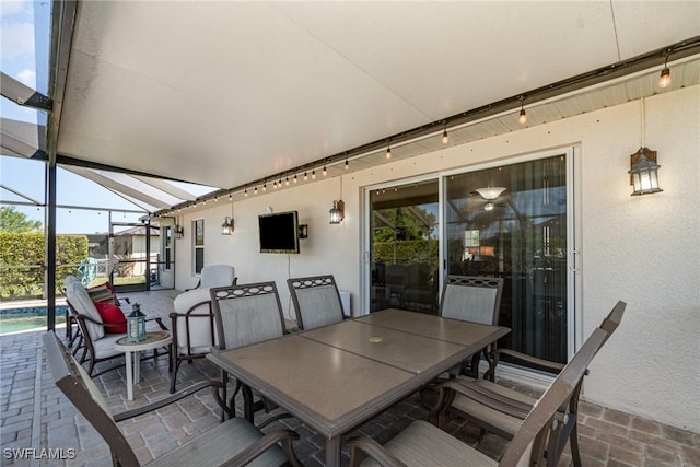 417 NW 3rd Ter, Cape Coral, FL 33993 - view of patio / terrace featuring a lanai, outdoor dining area, and an outdoor pool