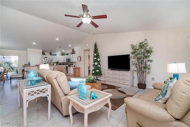 417 NW 3rd Ter, Cape Coral, FL 33993 - living room featuring light tile patterned flooring, lofted ceiling, and ceiling fan
