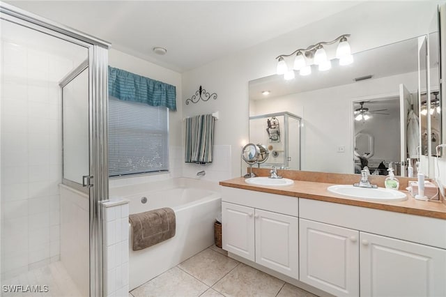 417 NW 3rd Ter, Cape Coral, FL 33993 - full bathroom with a sink, a bath, a shower stall, and tile patterned flooring