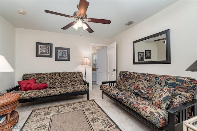 417 NW 3rd Ter, Cape Coral, FL 33993 - living area with tile patterned flooring, visible vents, and a ceiling fan