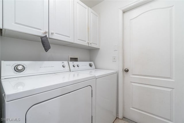 417 NW 3rd Ter, Cape Coral, FL 33993 - washroom with cabinet space and washing machine and dryer